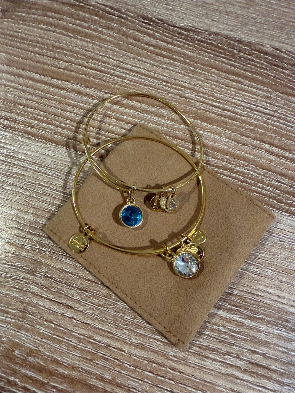 Alex and Ani Gold Bangle Duo with Blue and Clear Charms